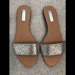 INC gold slides with silver accent stones